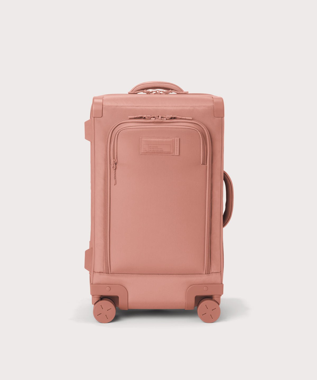 Front view of Seattle carry-on rolling luggage 20.5” in warm dust pink
