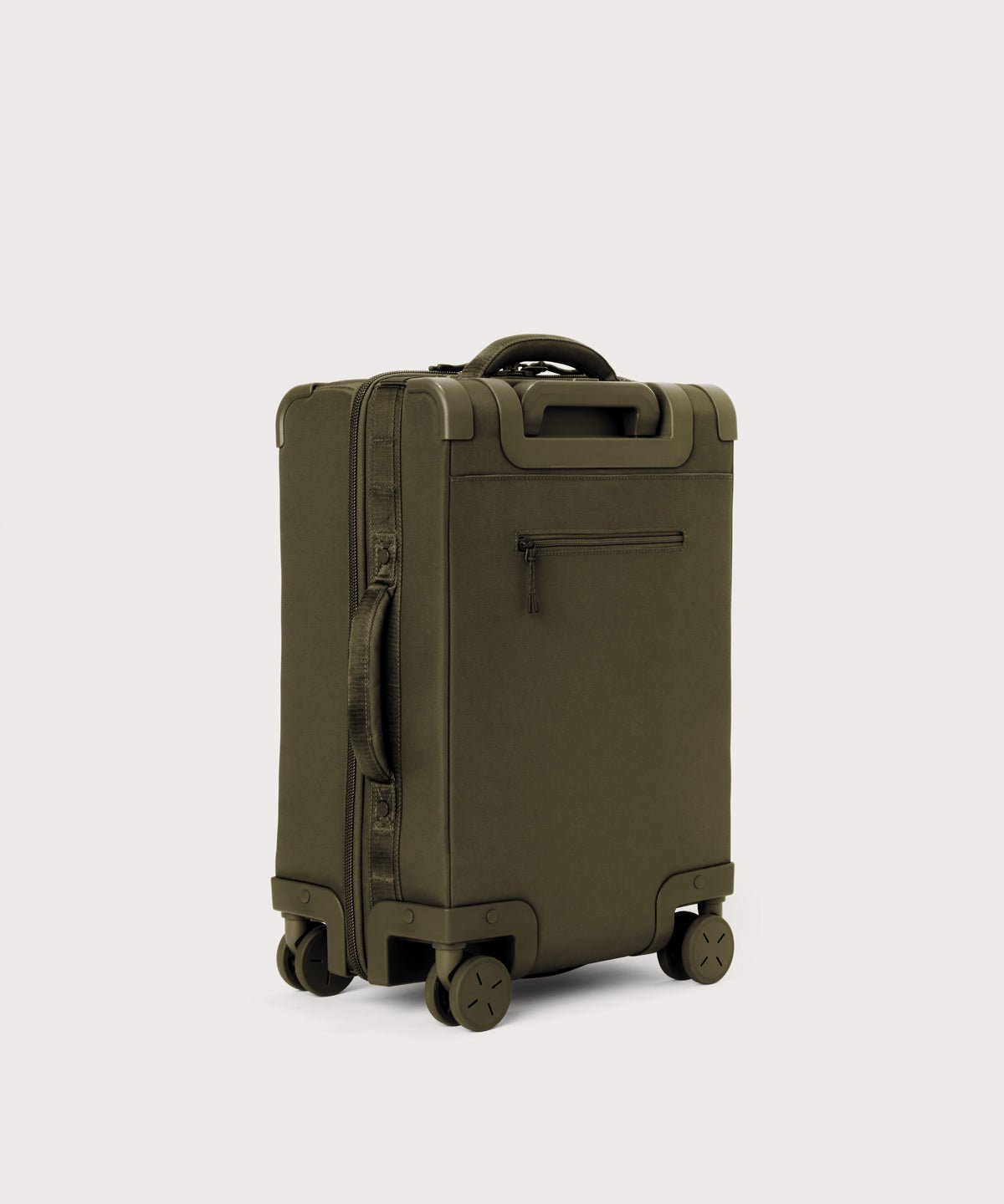 3/4 back view of Seattle carry-on rolling luggage 20.5” in dark green showing side handle and back zippered phone/passport pocket
