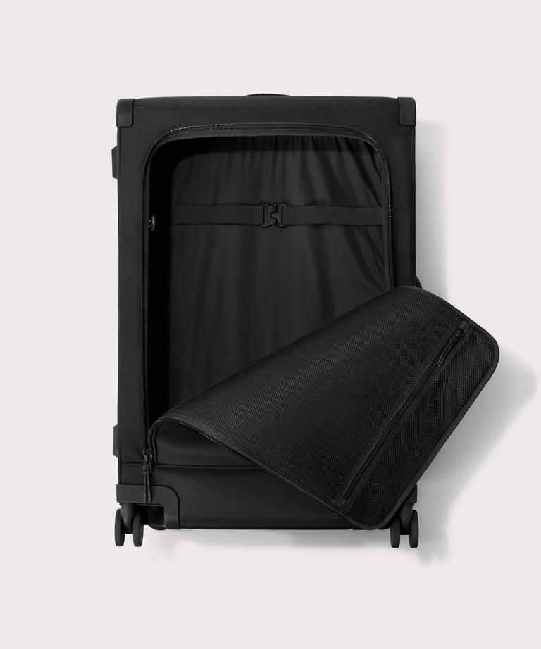 Front view of Sydney checked rolling luggage 28.5” in onyx with front flap opened
