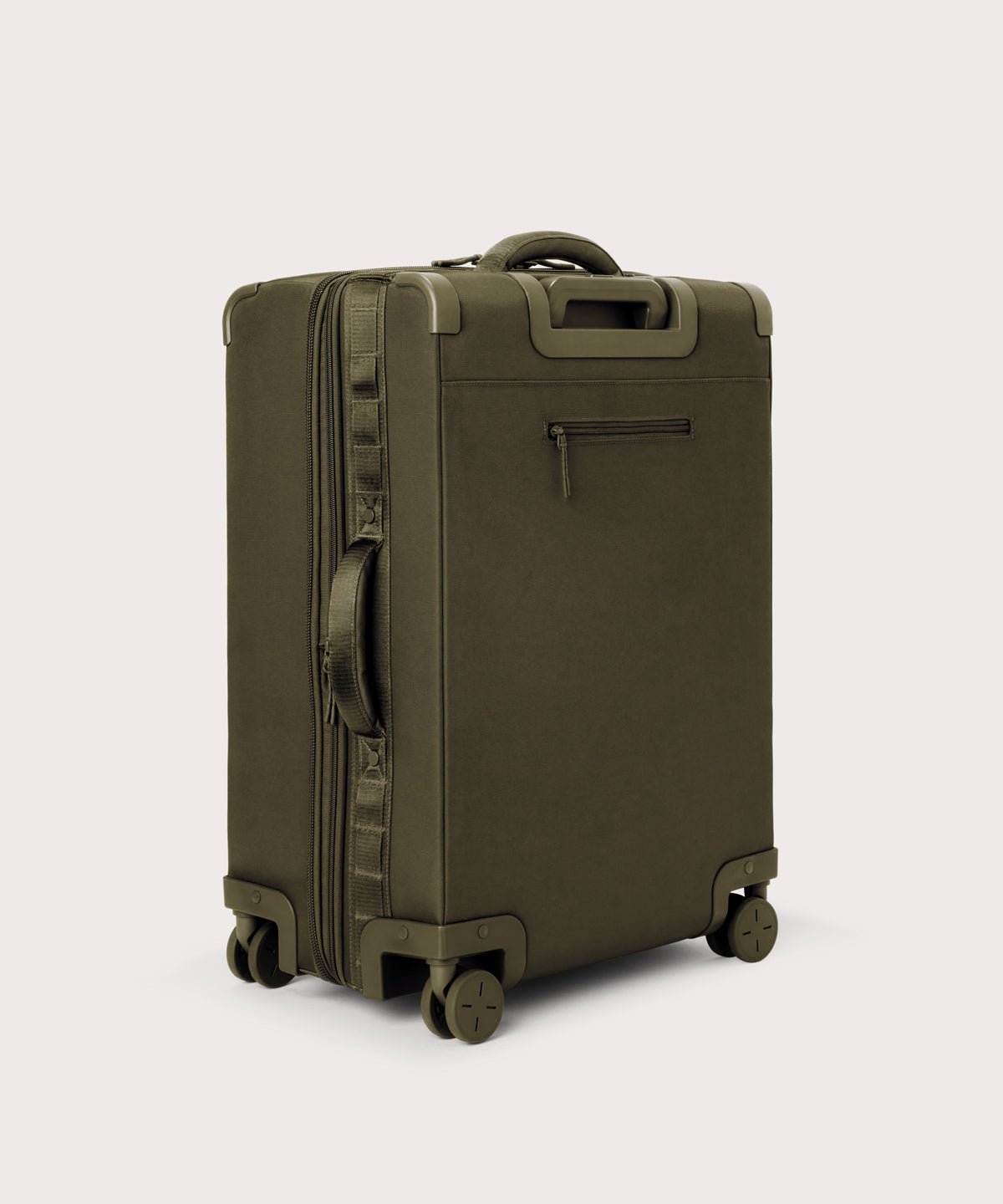 3/4 back view of Sydney checked rolling luggage 25" in dark moss showing side handle and back zippered phone/passport pocket
