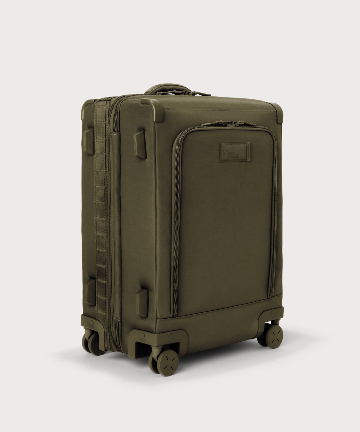 3/4 front view of Sydney checked rolling luggage 25" in dark moss showing side luggage feet

