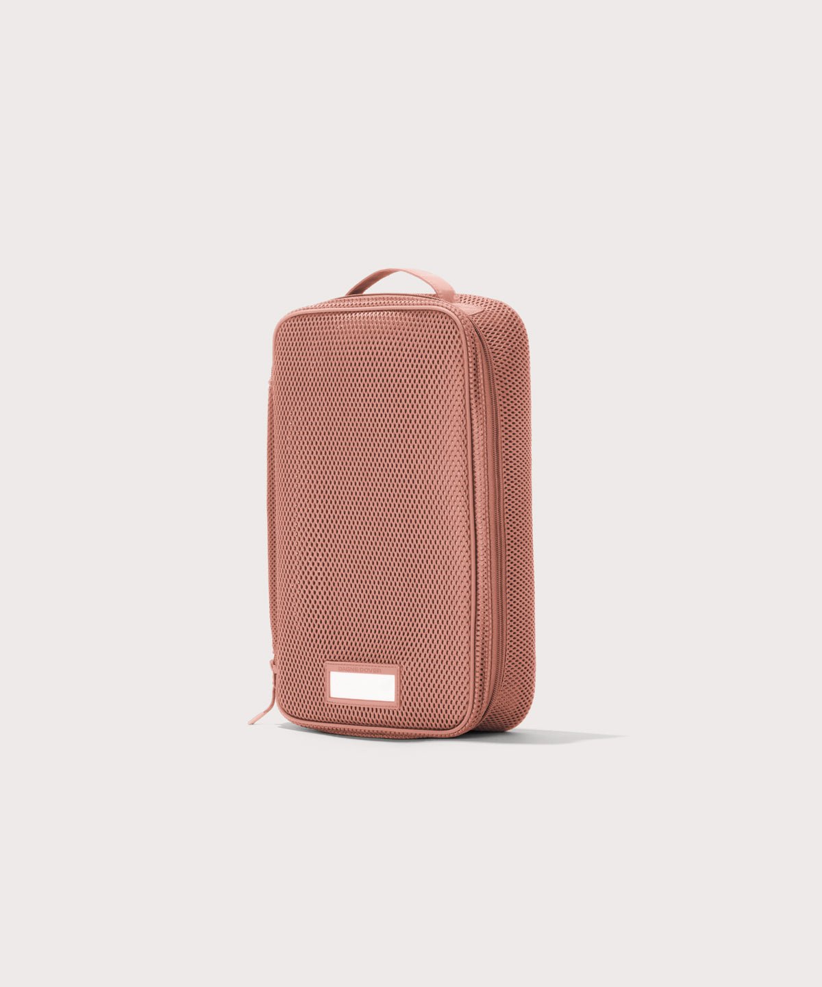 3/4 view of medium Roma packing cube in warm dust pink
