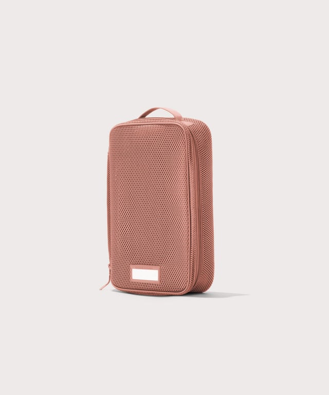 3/4 view of medium Roma packing cube in warm dust pink
