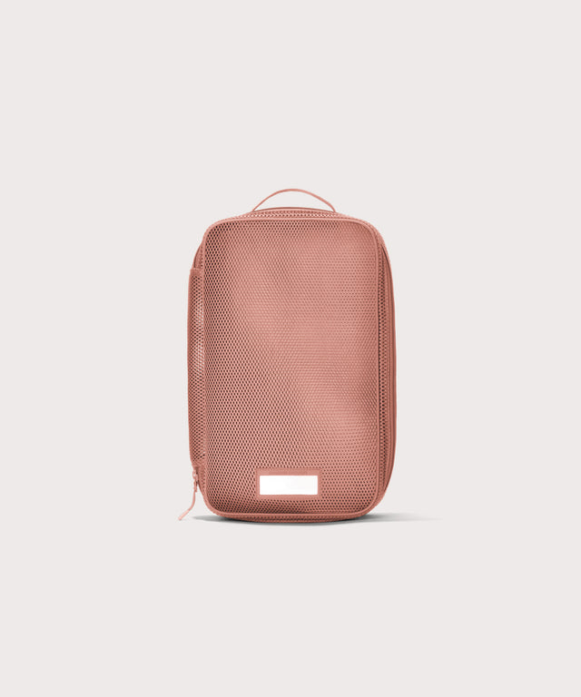 Front view of medium Roma packing cube in warm dust pink
